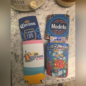 Set of Coozies, One Ed Hardy Can Cooler with Tags, 2 Corona, 1 Modelo